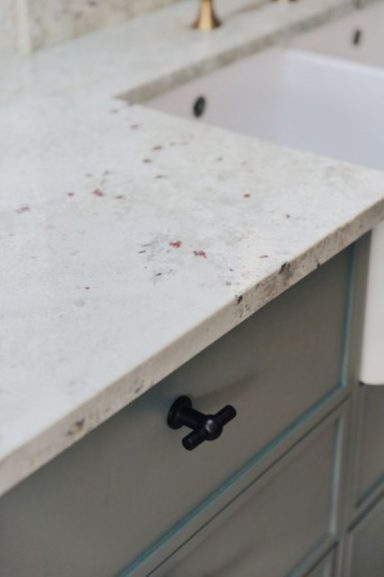 Edge detail of a kitchen worktop and bespoke drawer fronts below, made in Sheffield.
