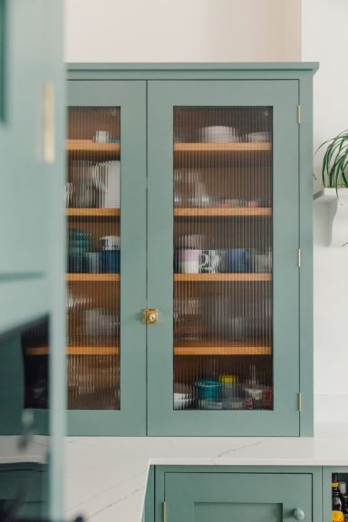 Bespoke glazed shaker kitchen doors with fluted glass painted with farrow and ball paint. Made in Sheffield