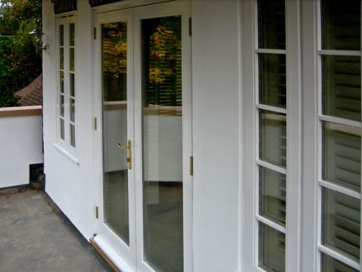 Bespoke hardwood French doors with side lights and Georgian bars. Made in Sheffield.