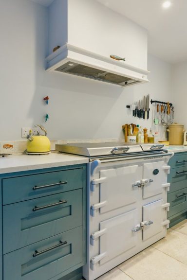 Custom Shaker kitchen with bespoke cooker hood and Range cooker.