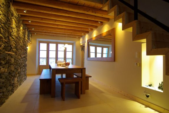 Bespoke furniture with a dining table and chairs, made from oak.