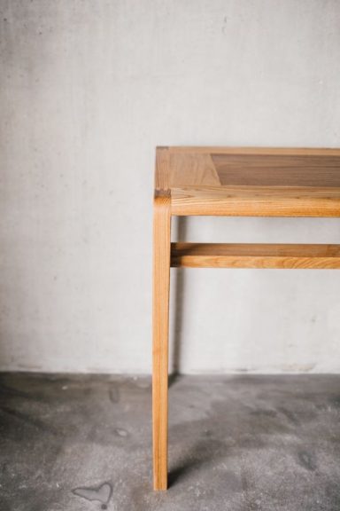 The leg detail of a hardwood sideboard hand made in Sheffield.
