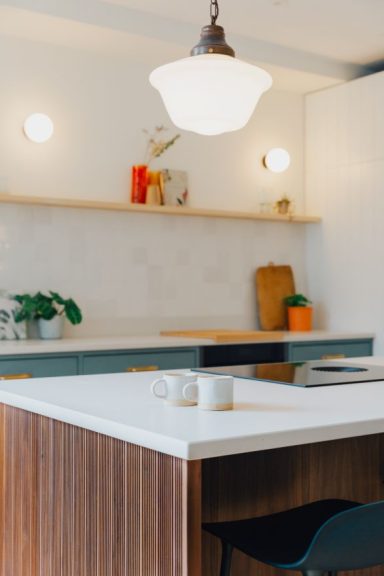 Stone worktops in a modern handmade bespoke kitchen.