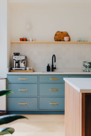 Beautifully made in frame kitchen with a natural stone worktop.